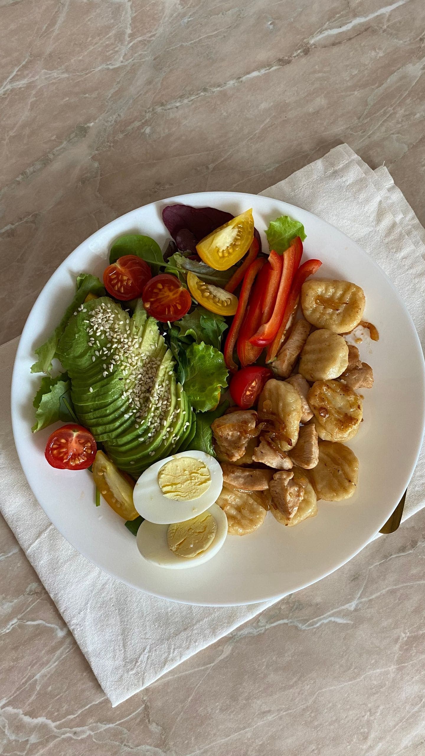 Grilled chicken salad bowl assembled with fresh greens