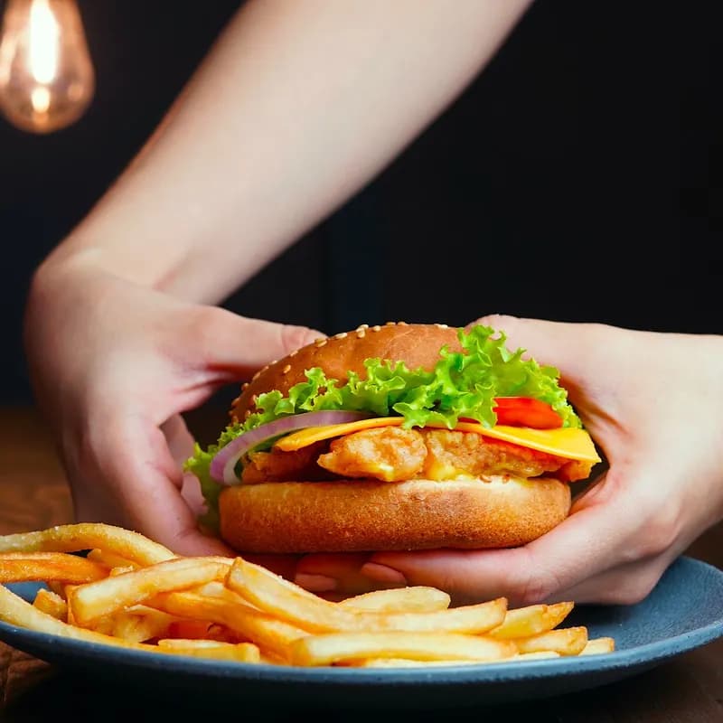 Cheeseburger with lettuce served with fries, a Wendy's gluten free burger order needs no bun