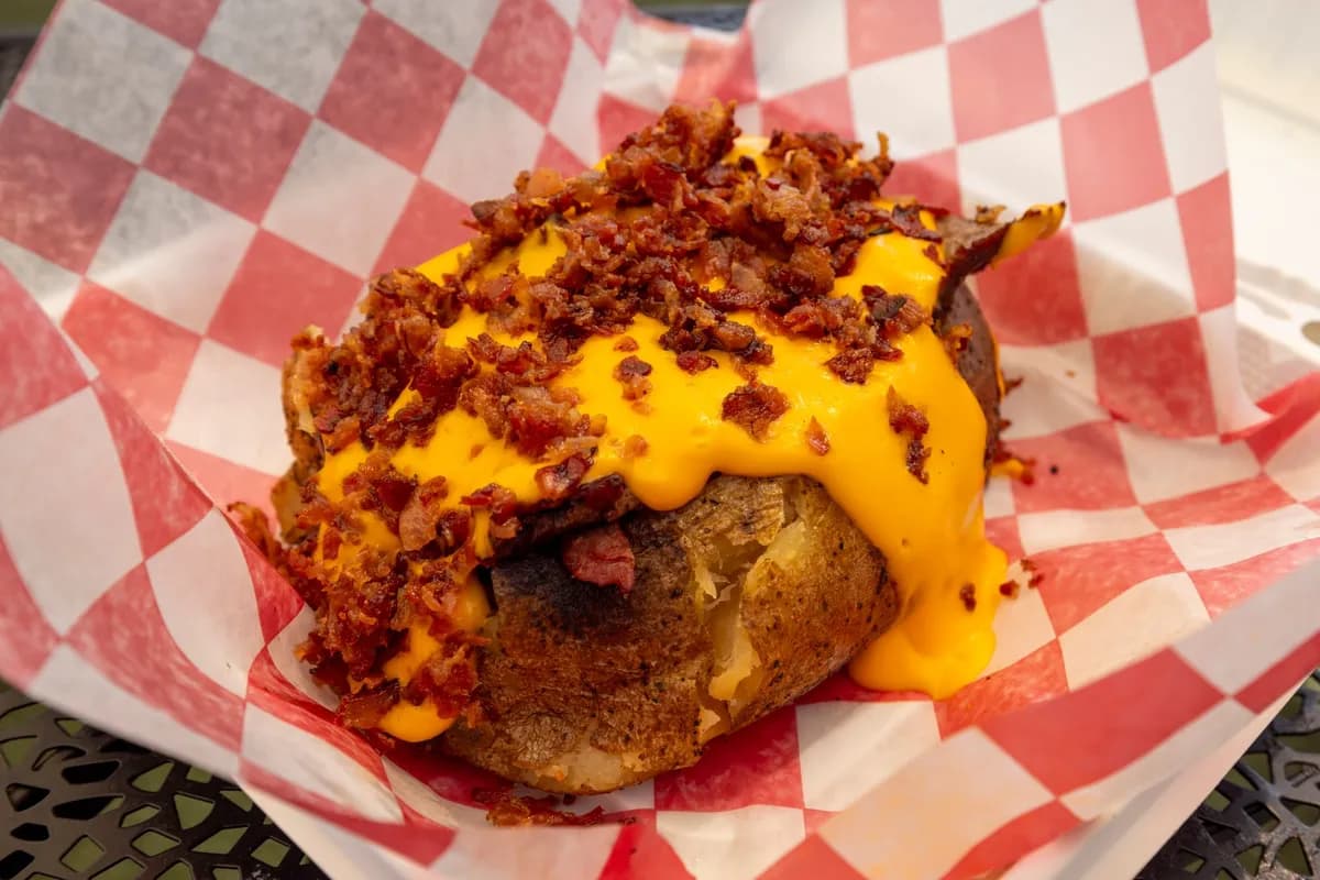 Loaded baked potato with melted cheese and bacon, like a Wendy's baked potato gluten free topping choice