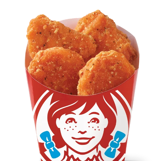Wendy’s 4-piece Spicy Chicken Nuggets with crispy coating and bold seasoning, served hot and ready to dip.