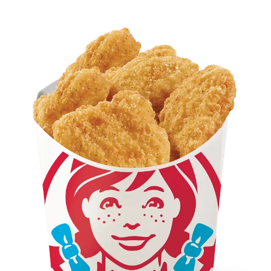 Wendy’s 6-piece Chicken Nuggets, golden and crispy, made with all-white meat and served hot with dipping sauce.