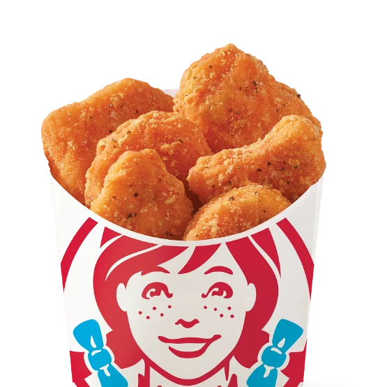 Wendy’s 6-piece Spicy Chicken Nuggets, crispy and seasoned with bold spices, served hot and perfect for dipping.