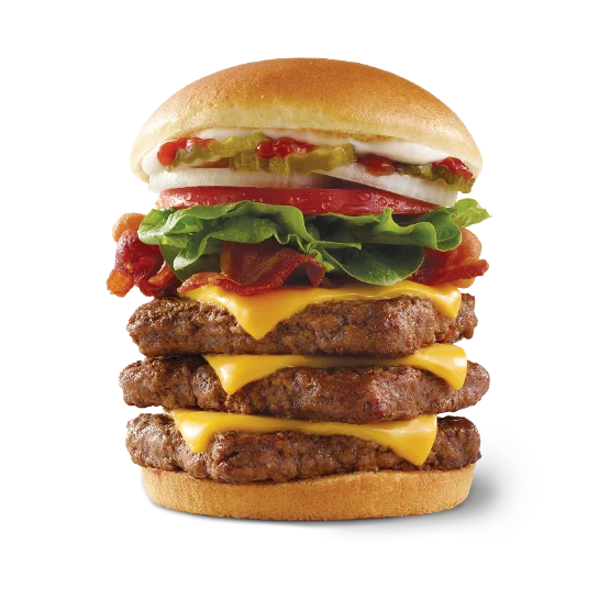 Wendy’s Big Bacon Classic® Triple stacked with three fresh beef patties, bacon, cheese, lettuce, tomato, pickles, onions, ketchup, and mayo on a toasted bun.