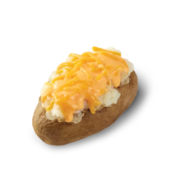 Wendy’s Cheese Baked Potato with a fluffy inside, topped with creamy cheese sauce and shredded cheddar cheese.