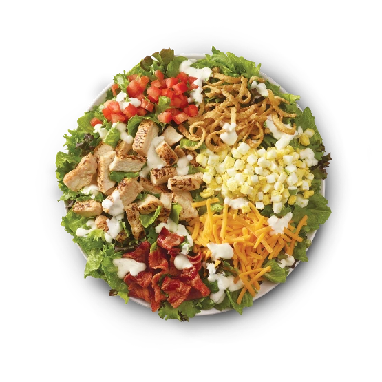 Wendy’s Cobb Salad with grilled chicken, romaine lettuce, tomatoes, bacon, egg, cheddar cheese, and ranch dressing.