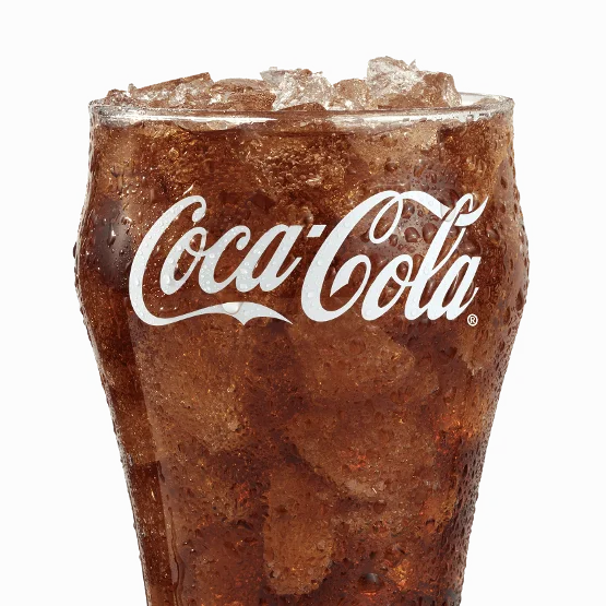 Wendy’s Coca-Cola® served over ice in a clear cup, fizzy and refreshing with a bold cola flavor.