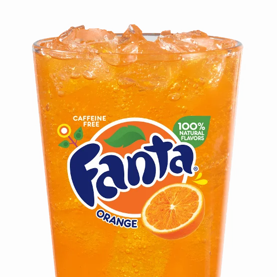 Wendy’s Fanta® Orange served over ice in a clear cup, bright orange and fizzy with sweet citrus flavor.