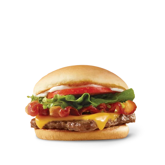Wendy’s Jr. Bacon Cheeseburger with a beef patty, crispy bacon, American cheese, lettuce, tomato, and mayo on a toasted bun.