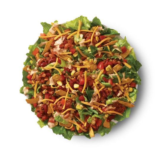 Wendy’s Taco Salad with lettuce, seasoned chili, shredded cheese, salsa, sour cream, and tortilla chips.