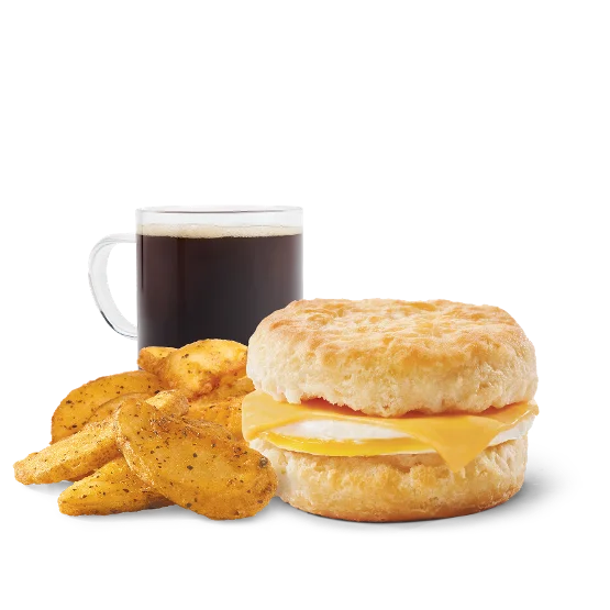 Wendy’s Egg & Cheese Biscuit Combo with a fluffy egg and melted cheese on a warm buttermilk biscuit, served with breakfast potatoes and a drink.